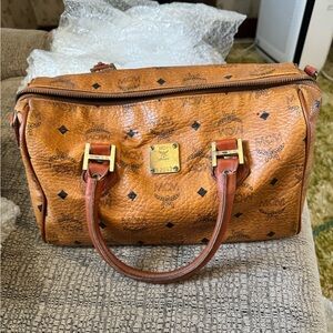 MCM Tan Leather with Gold Logo Pattern